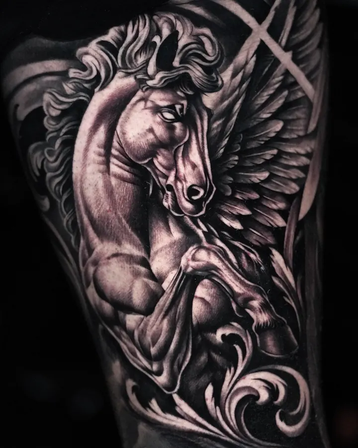 Pegaso con las alas abiertas y ornamentos barrocos